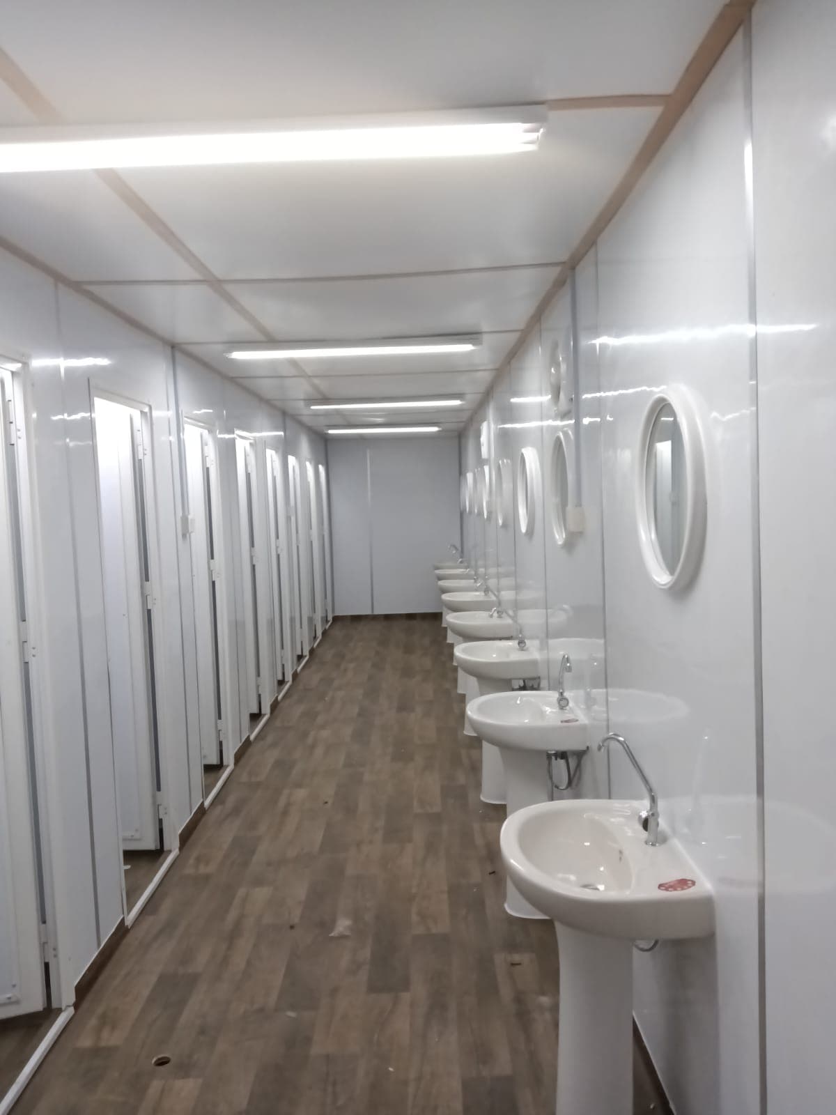 Toilets Cabins - Portable hygiene-focused restrooms designed for high-traffic construction environments.